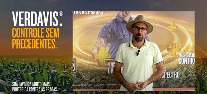 Cristhyano Zandona aparece em frente a um banner do Verdavis com o letreiro "Verdavis. Controle sem precedentes. Sua lavoura muito mais protegida contra as pragas."